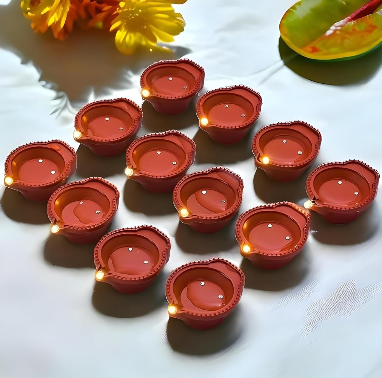 LUMINI 12 Pcs Water Sensor Diya Lights Electric Flameless & Smokeless LED Diyas | Eco-Friendly Led Diyas Candle Warm Ambient Lights for Home Decor, Diwali Festivals Decoration,Christmas,New Year(12)